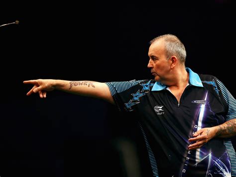 Phil Taylor on how to play darts .